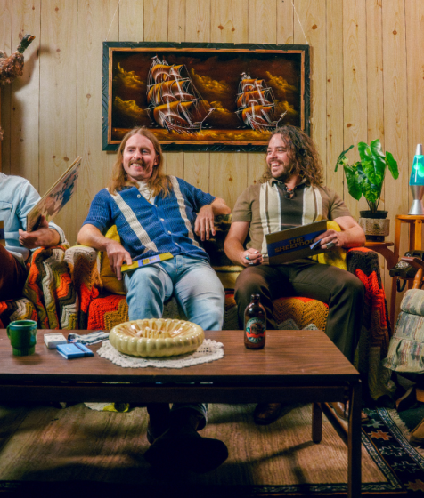 The Sheepdogs sit on a 1970s couch at Scotiabank Centre
