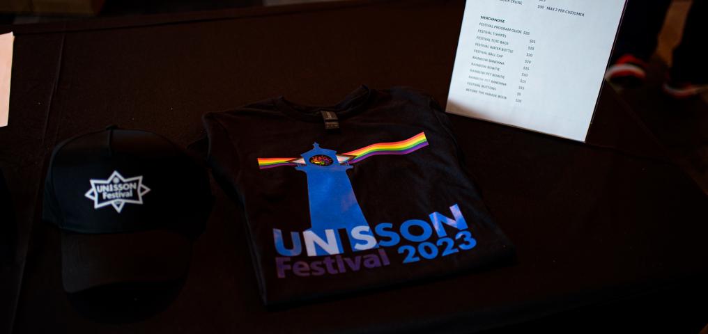 UNISON t-shirt and hat shown on display table